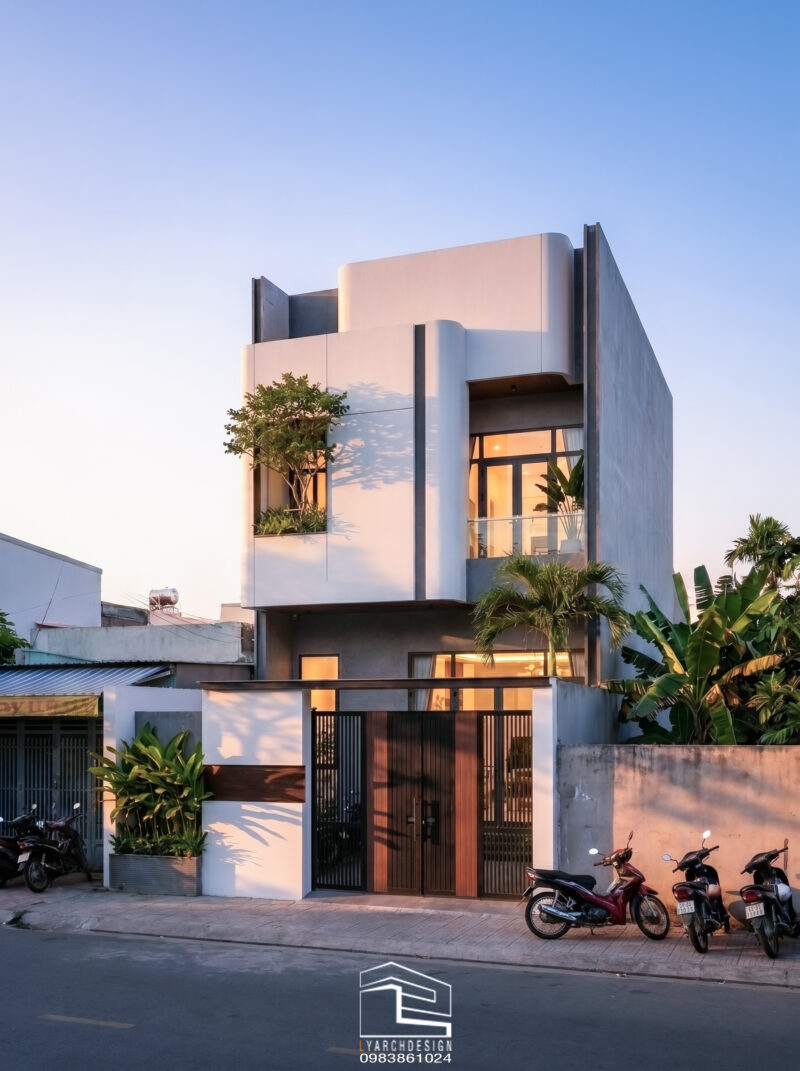 Nhà phố 2 tầng hiện đại với đường cong mặt tiền độc đáo và cuốn hút Nhà phố 2 tầng hiện đại với đường cong mặt tiền độc đáo và cuốn hút